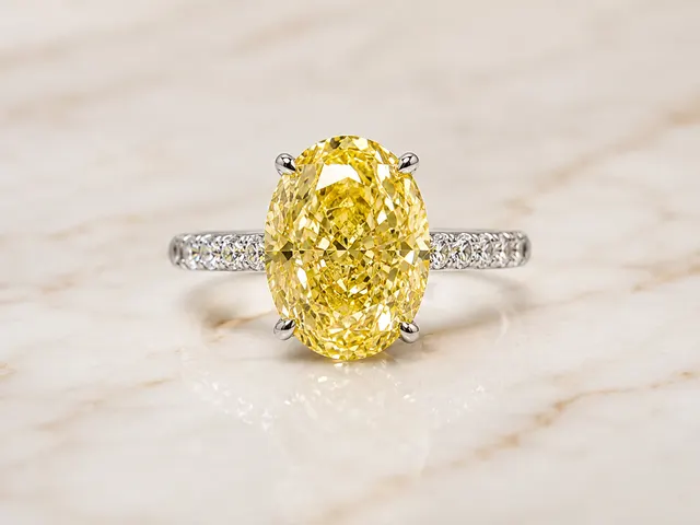 Fancy Yellow Oval Lab Grown Diamond Engagement Ring Four-Prong Solitaire 14K White Gold Pavé Band