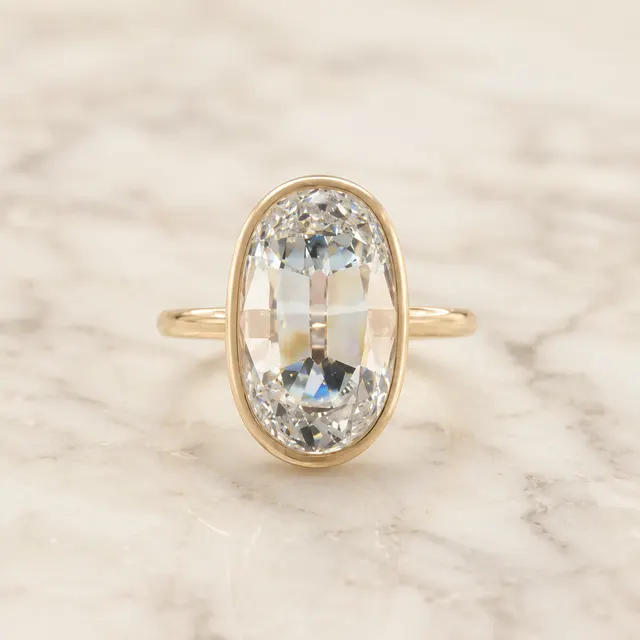 Oval Lab Grown Diamond Engagement Ring Bezel Solitaire 14K Yellow Gold E Color